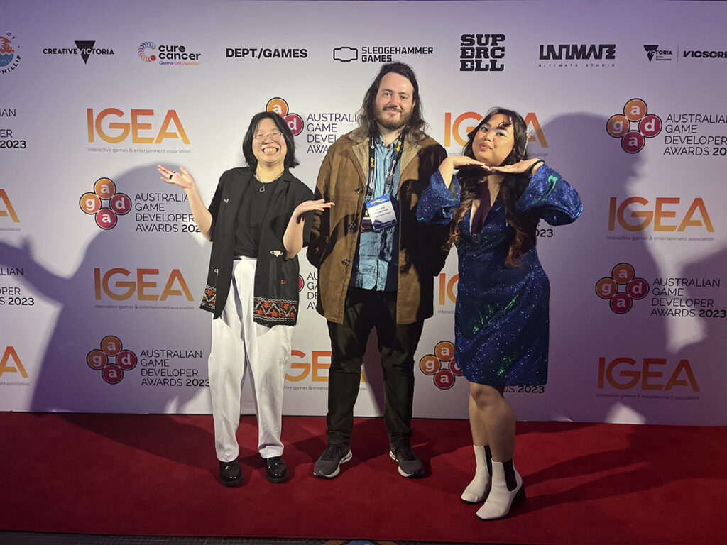 A photo of Ann, Reuben and Christine at the AGDAs.