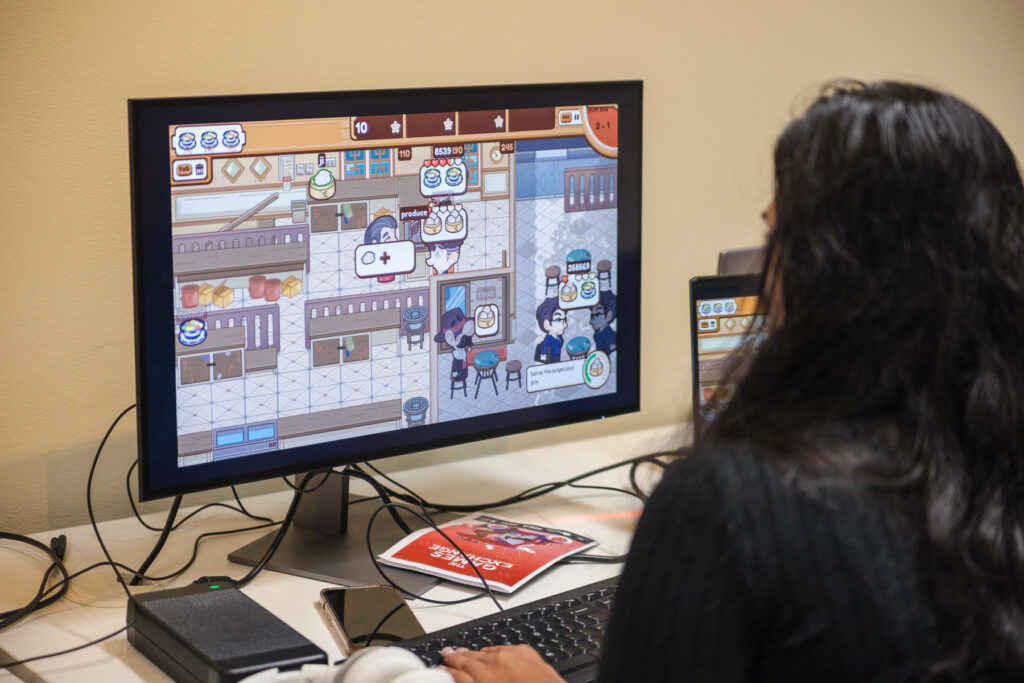 Some Sydney attendees playing The Chef's Shift by Panitia GameDev