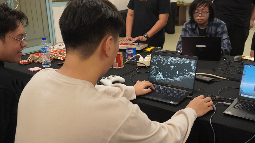 Some of our Indonesian friends playing Keyfairy by Owl Machine.