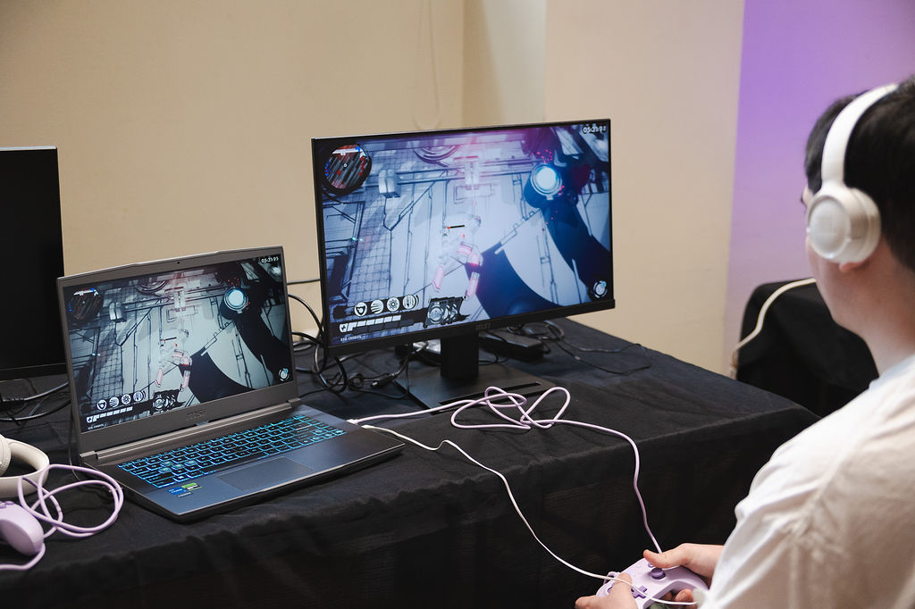 Some folks trying out games at the Games Exchange