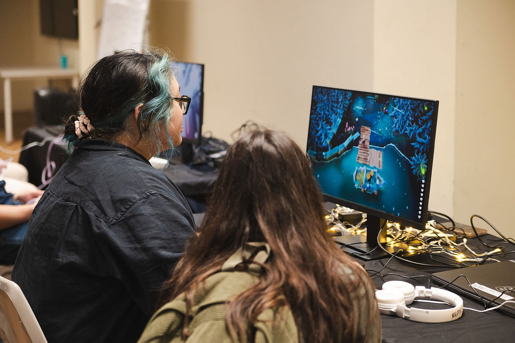 Some folks playing Apricity, by Trickbyte Games.