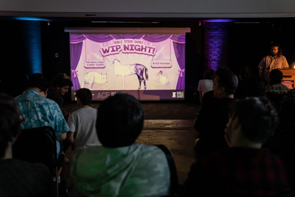 Reuben speaking and welcoming everyone to WIP Night